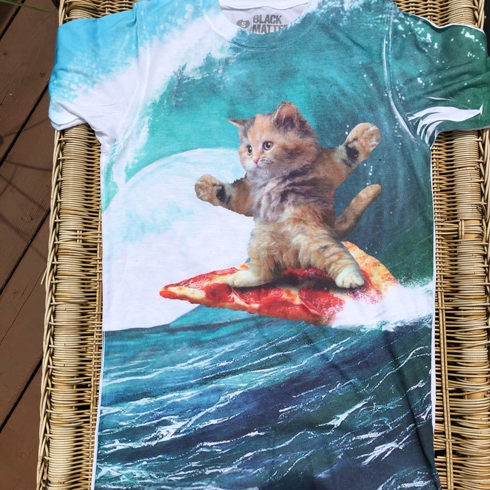 Black Matter— Cat surfing on pizza graphic tee
